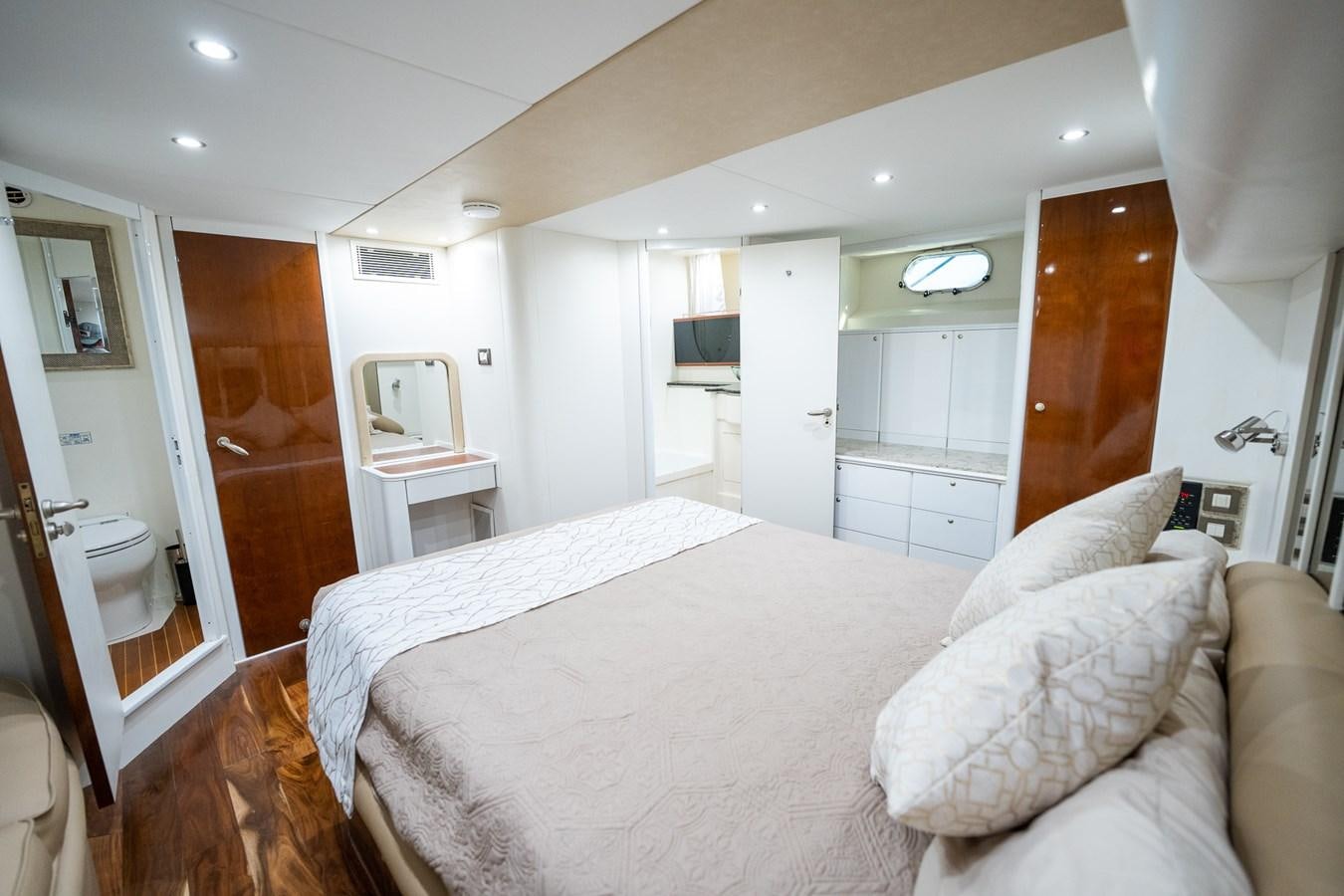 a large white bedroom with a large bed aboard ANGEL DEL MAR Yacht for Sale