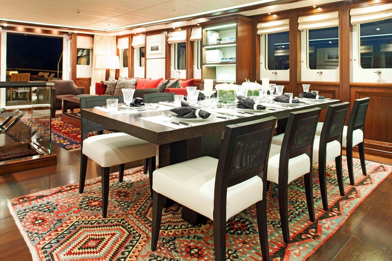 a dining table in a restaurant aboard ICE LADY Yacht for Sale
