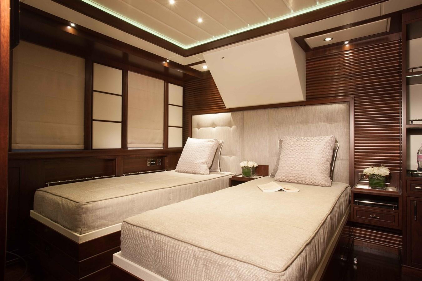 a hotel room with a bed aboard ICE LADY Yacht for Sale