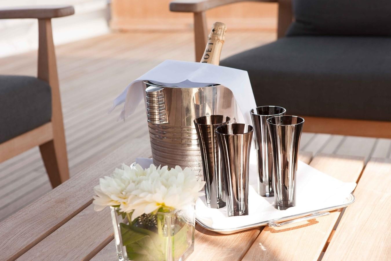 a coffee maker on a table aboard ICE LADY Yacht for Sale