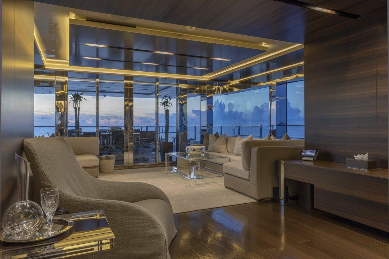 a living room with a large window aboard SAFE HAVEN Yacht for Charter