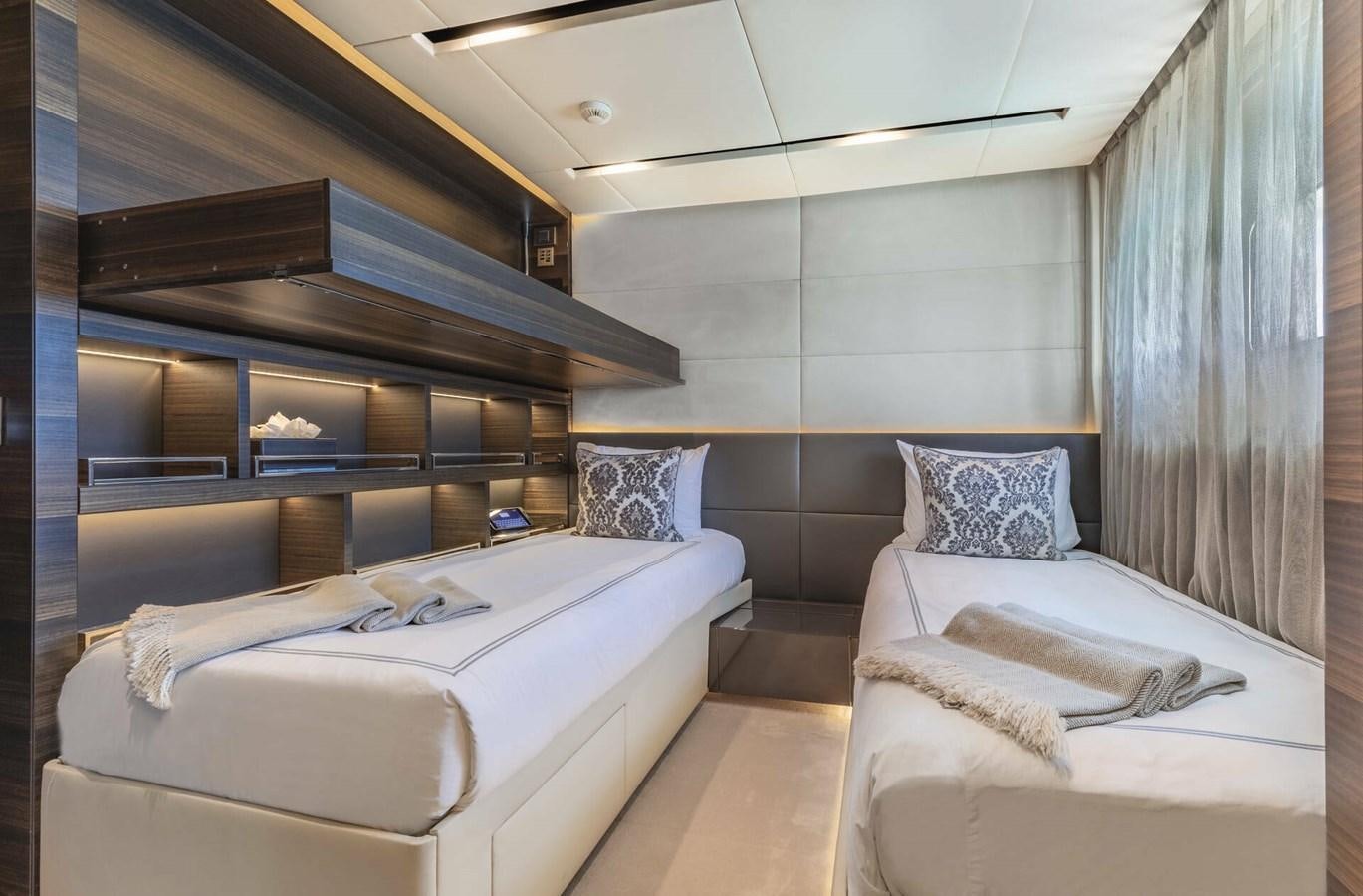 a room with two beds aboard SAFE HAVEN Yacht for Charter