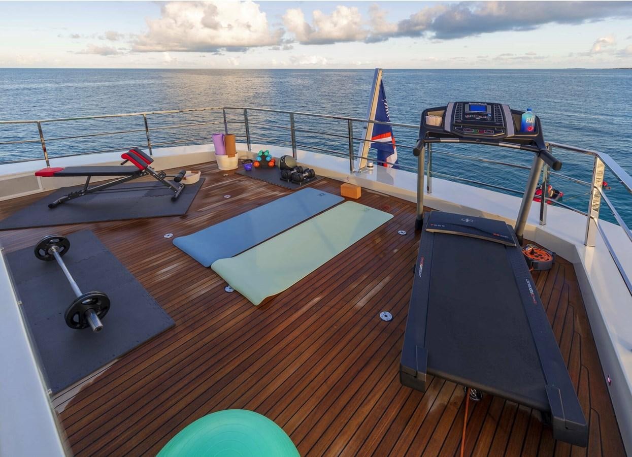a deck with a boat on it aboard SAFE HAVEN Yacht for Charter