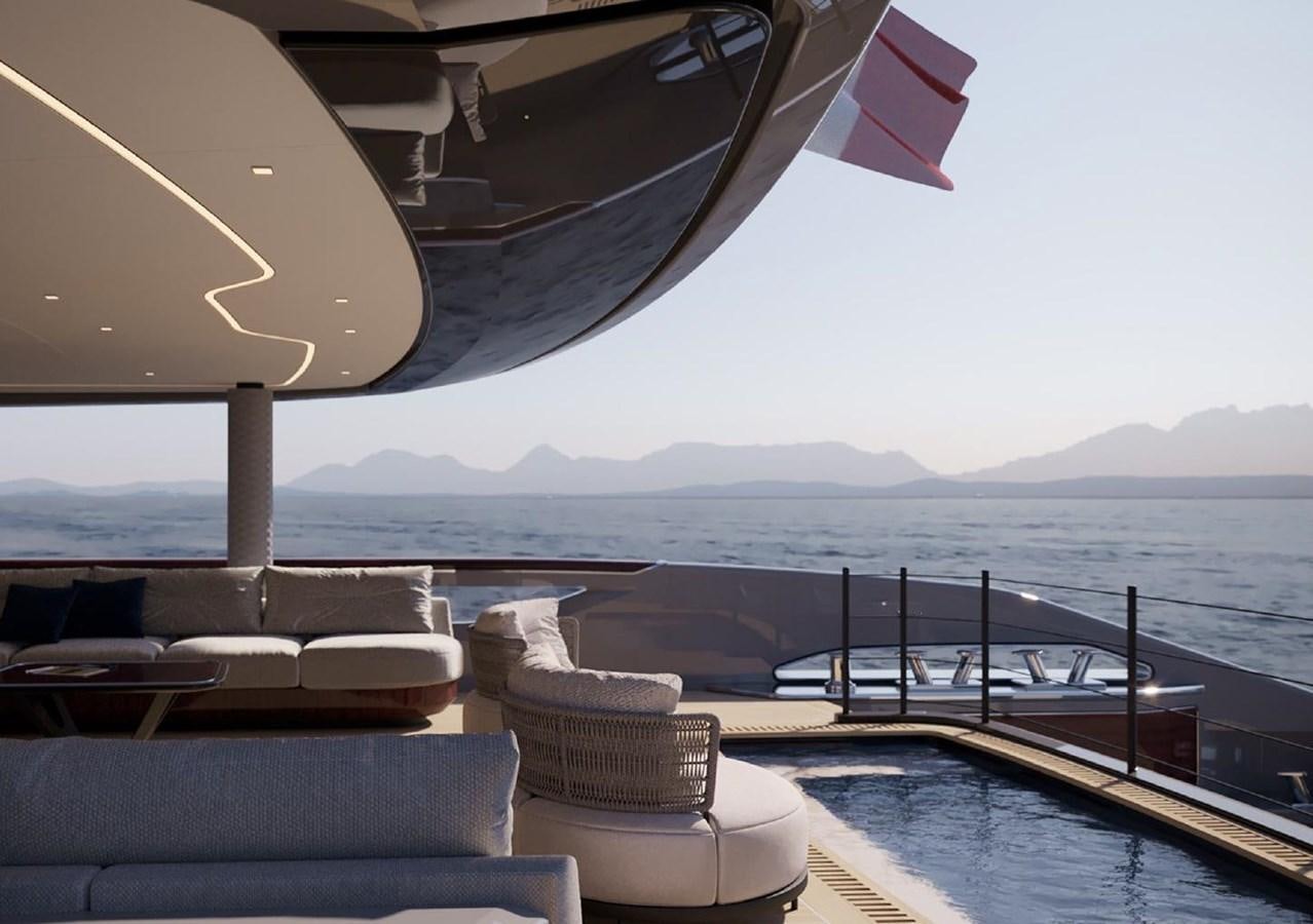 a deck with chairs and a flag aboard ON SPEC ORDER Yacht for Sale