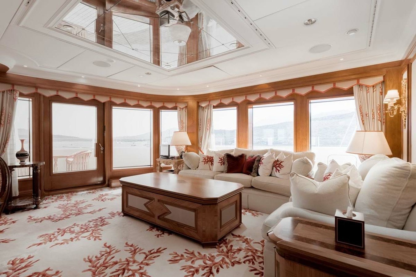 a living room with a large window aboard PURE Yacht for Sale