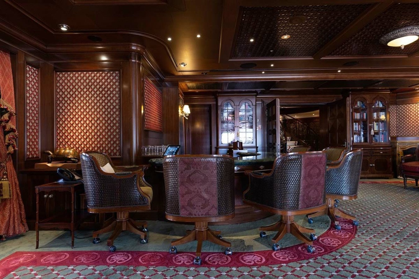 a large room with chairs and a table aboard PURE Yacht for Sale