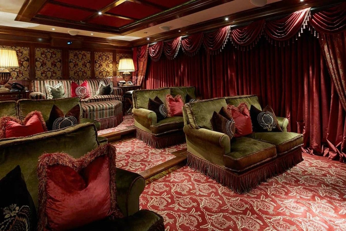 a living room with couches and a rug aboard PURE Yacht for Sale