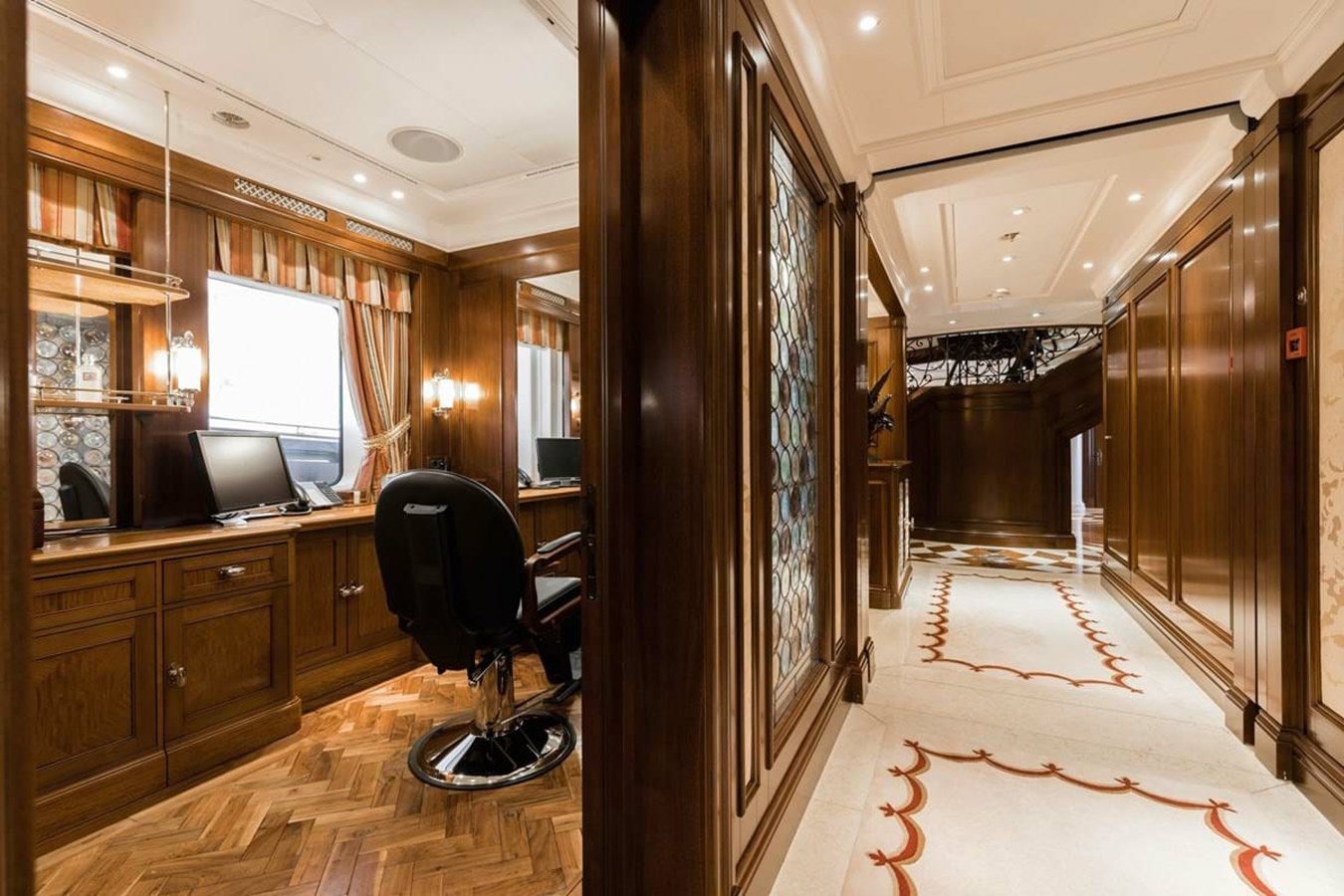 a chair in a room aboard PURE Yacht for Sale