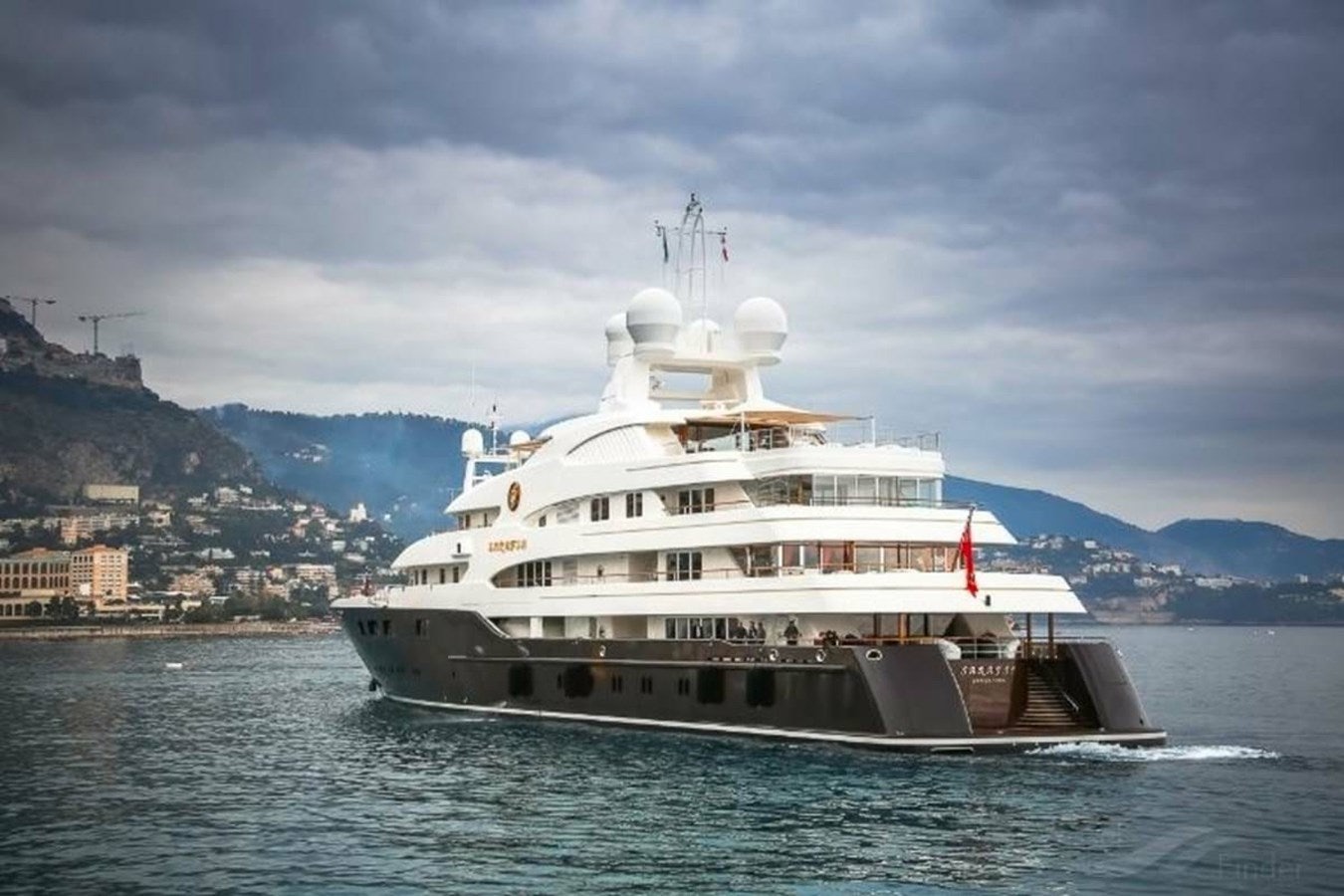 a large white boat in the water aboard PURE Yacht for Sale