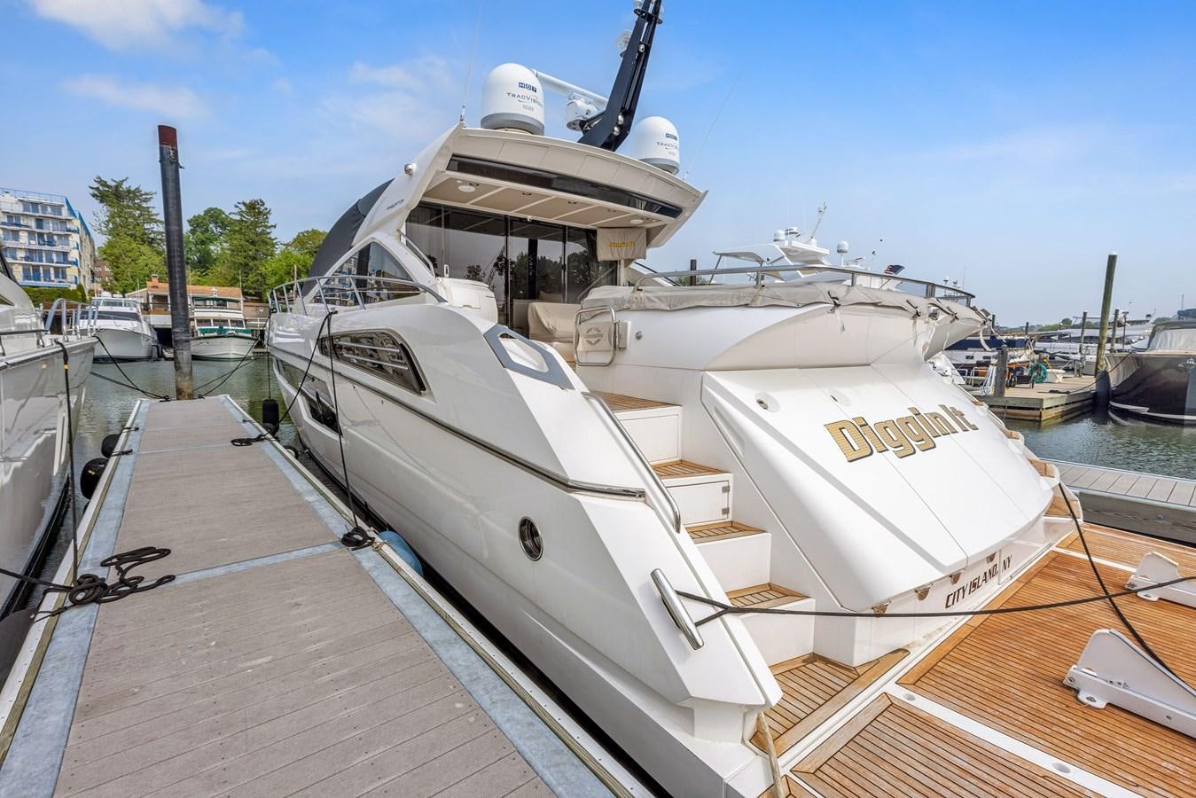 a boat docked at a dock aboard DIGGIN Yacht for Sale