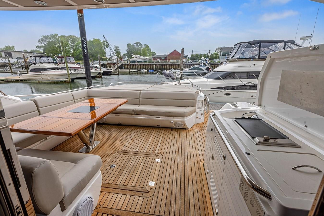a deck with boats parked on it aboard DIGGIN Yacht for Sale
