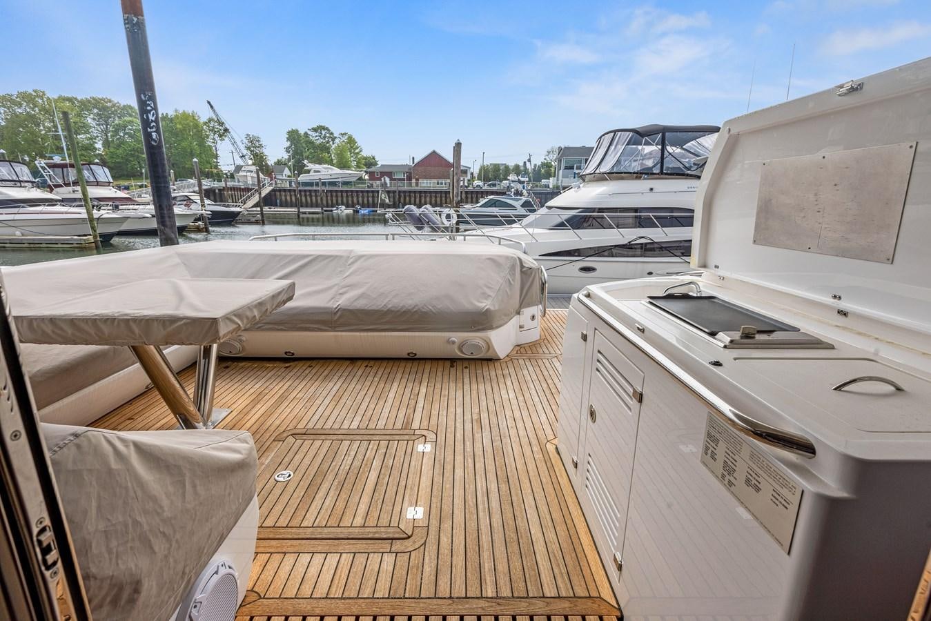 a boat on a deck aboard DIGGIN Yacht for Sale