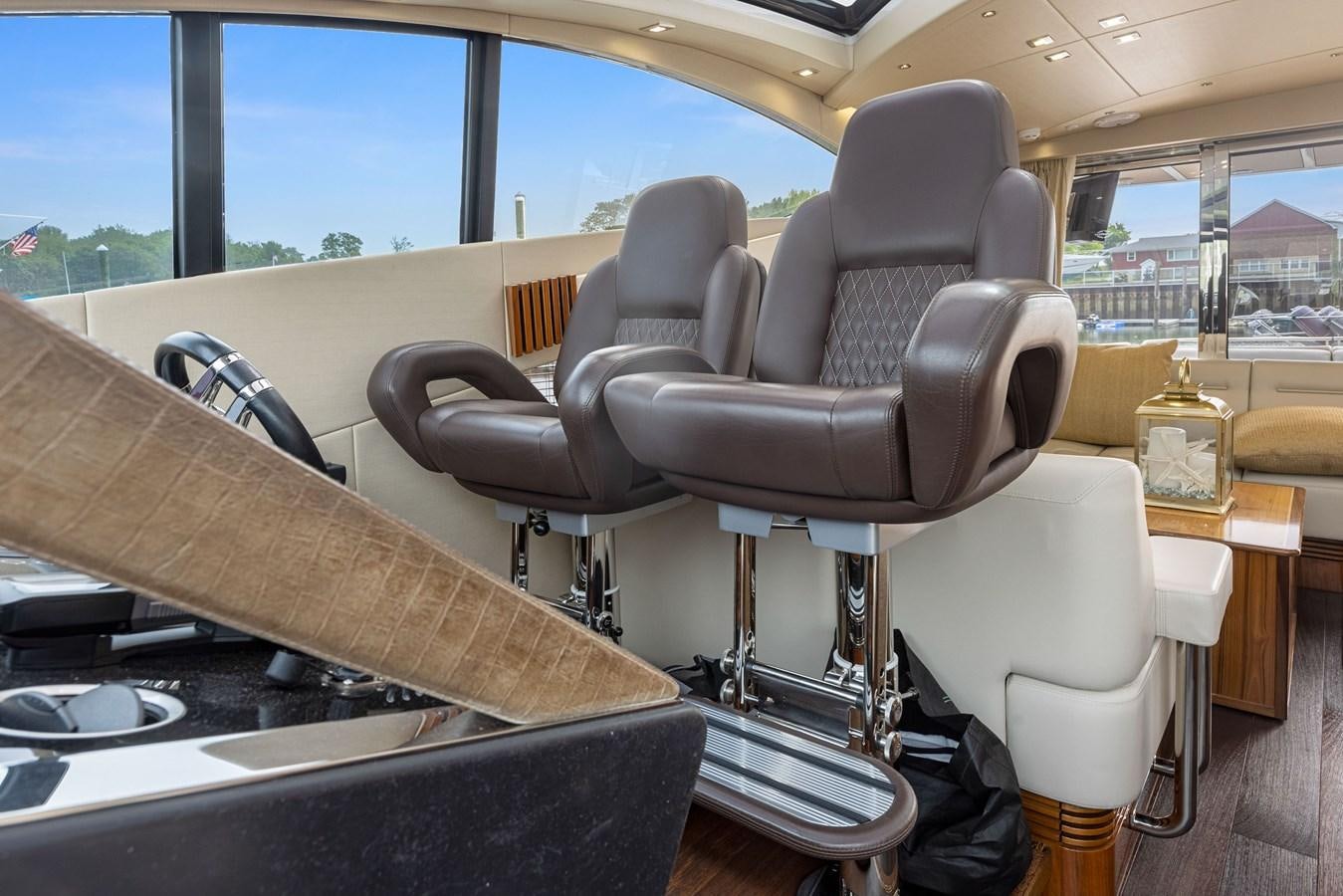 a car with seats and a table aboard DIGGIN Yacht for Sale