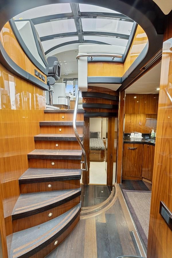 a wooden staircase in a house aboard DIGGIN Yacht for Sale