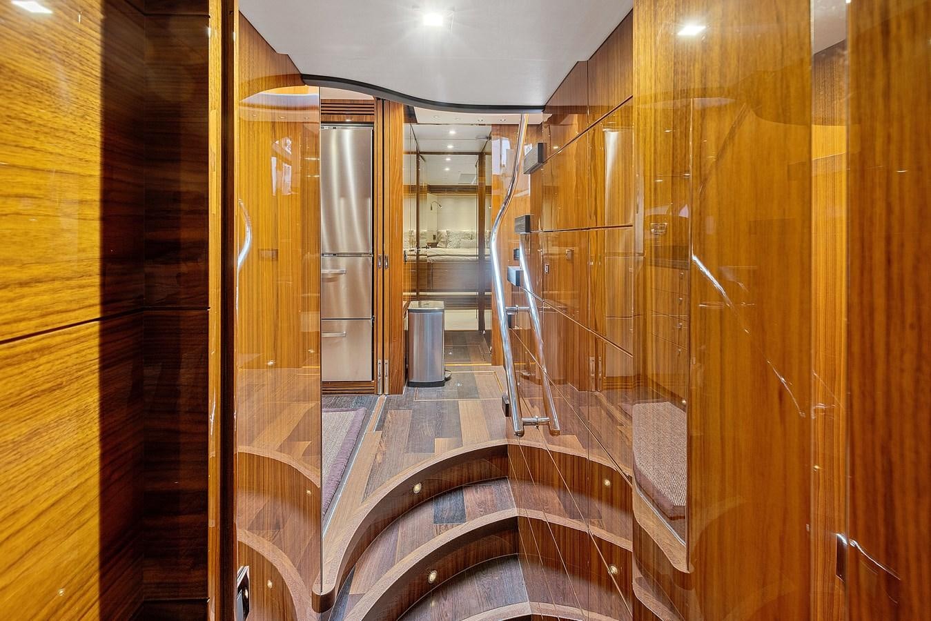 a hallway with glass doors aboard DIGGIN Yacht for Sale