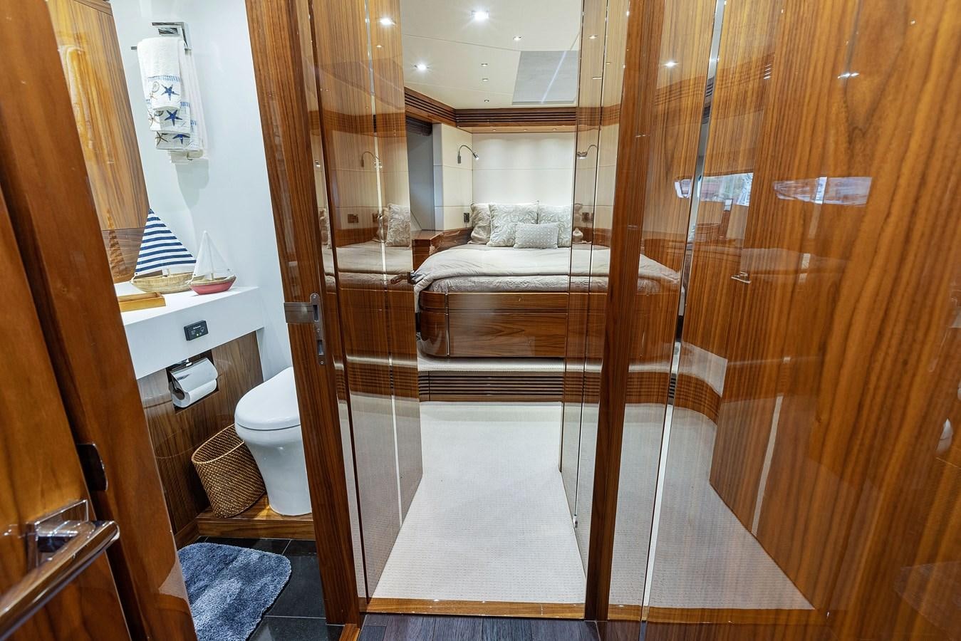 a bathroom with a glass shower aboard DIGGIN Yacht for Sale
