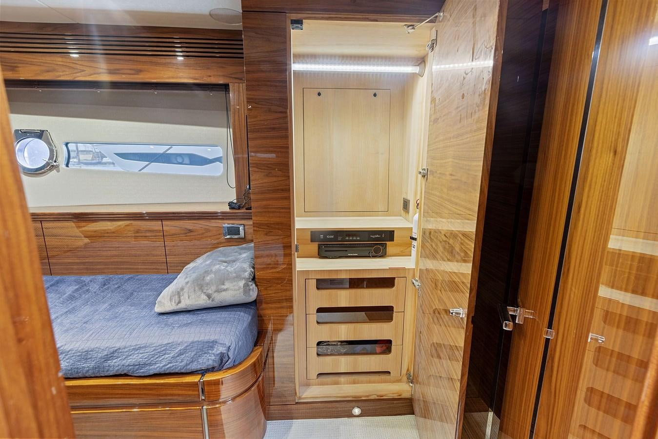 a bedroom with a bed aboard DIGGIN Yacht for Sale