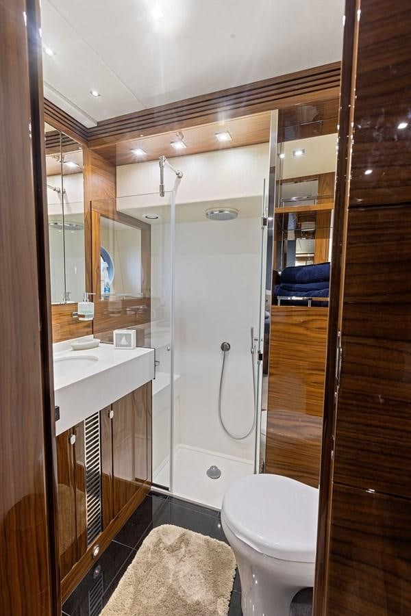 a bathroom with a shower and sink aboard DIGGIN Yacht for Sale