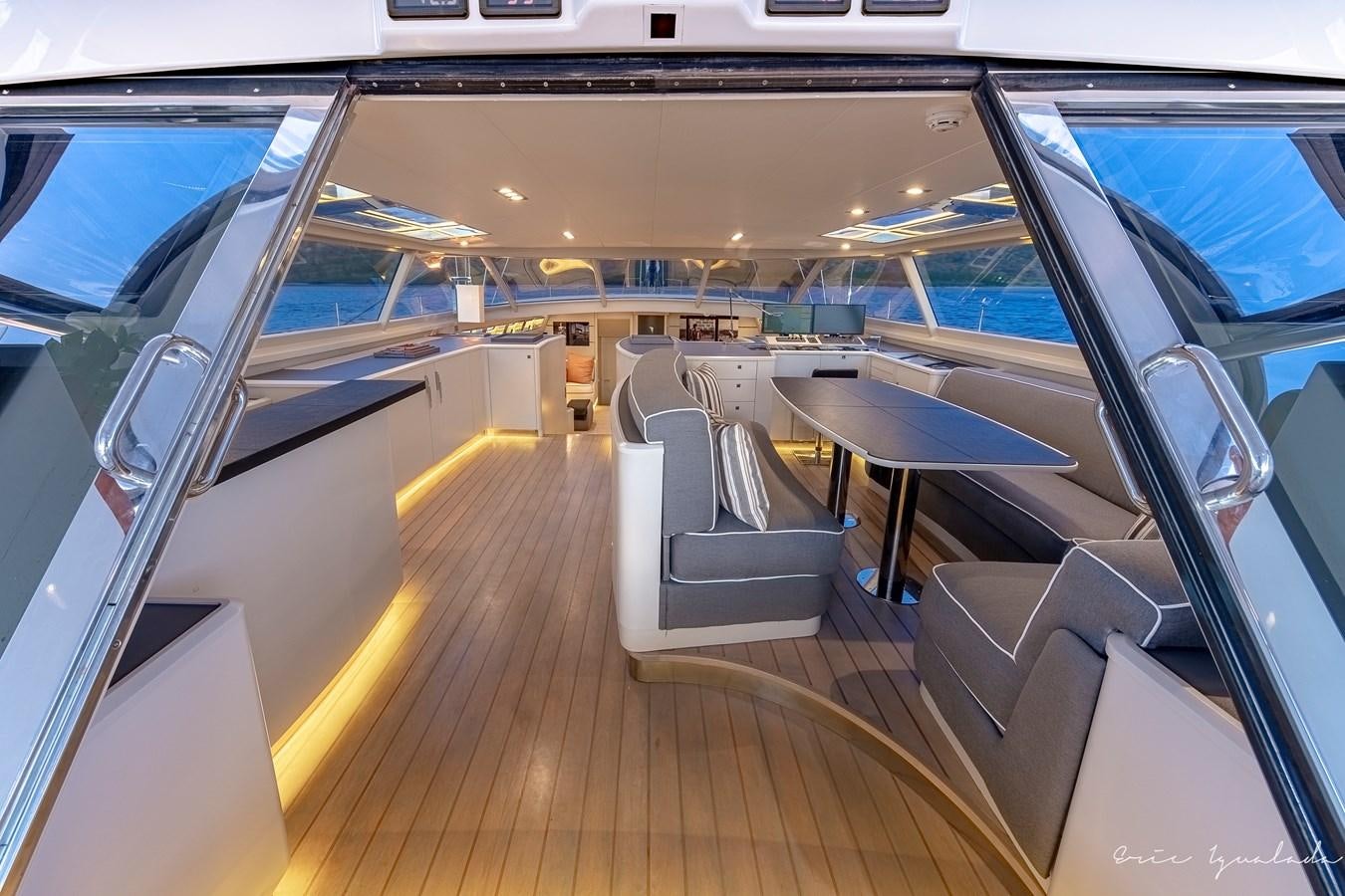 inside of a vehicle with a wood floor and a large window aboard MY STAR Yacht for Sale