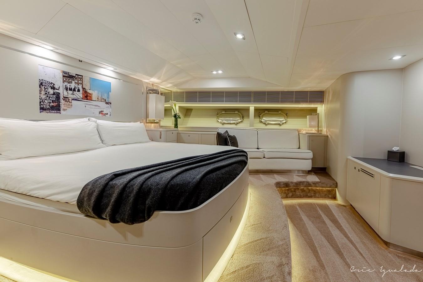 a room with a couple of beds aboard MY STAR Yacht for Sale