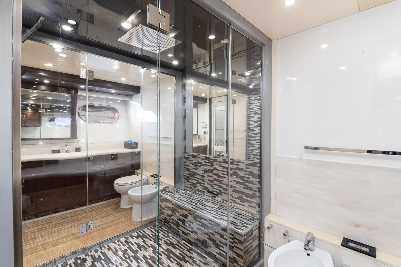 a bathroom with a glass shower aboard NIRVANA Yacht for Sale