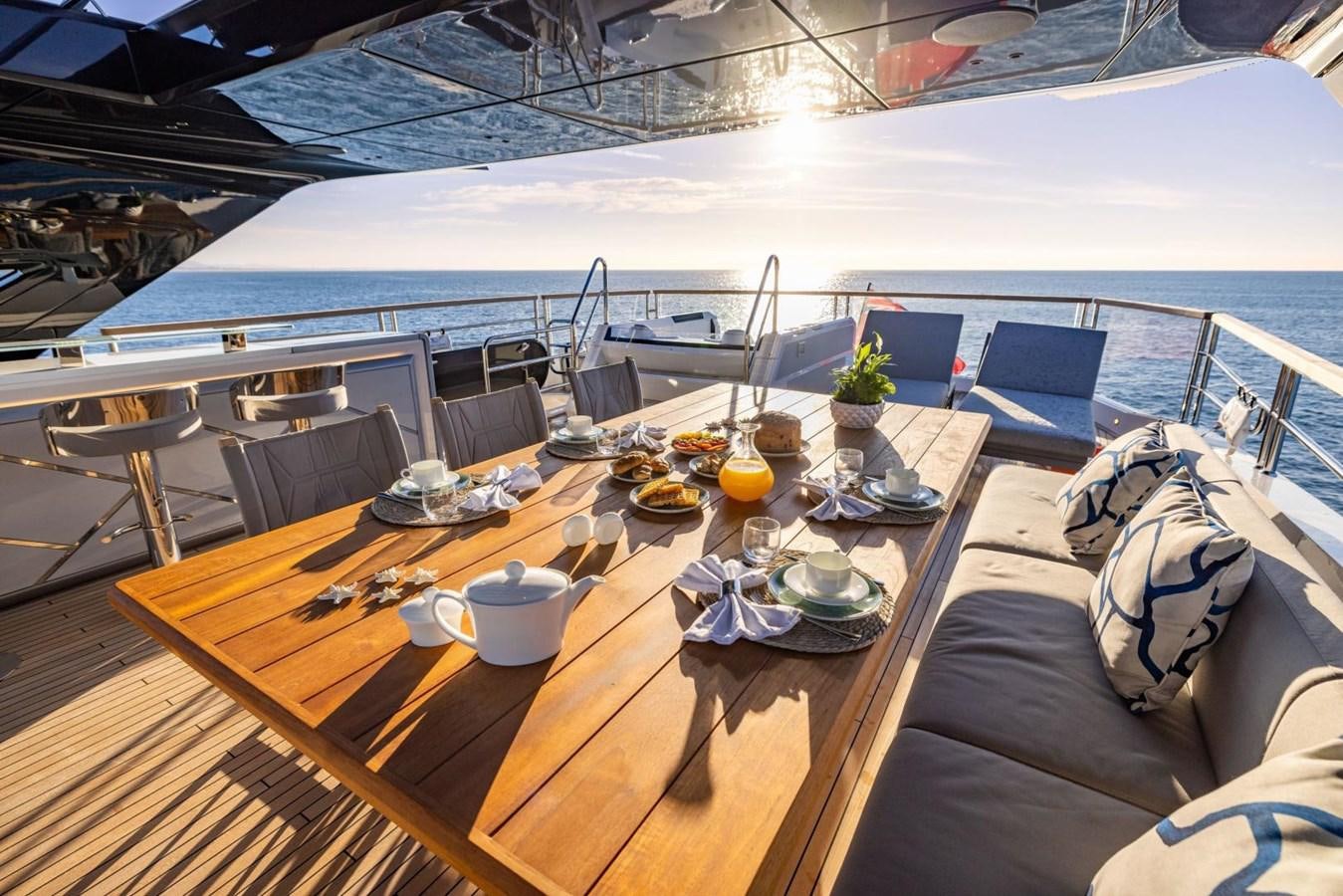 a dining table on a boat aboard SUNSEEKER 100 Yacht for Sale