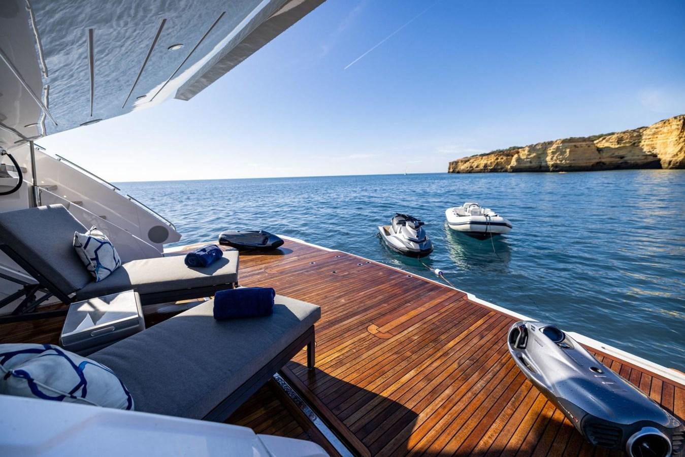 a boat on the water aboard SUNSEEKER 100 Yacht for Sale