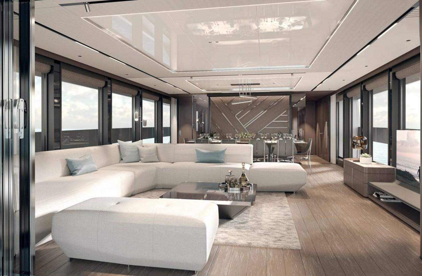 a room with a couch and a table aboard SUNSEEKER 100 Yacht for Sale