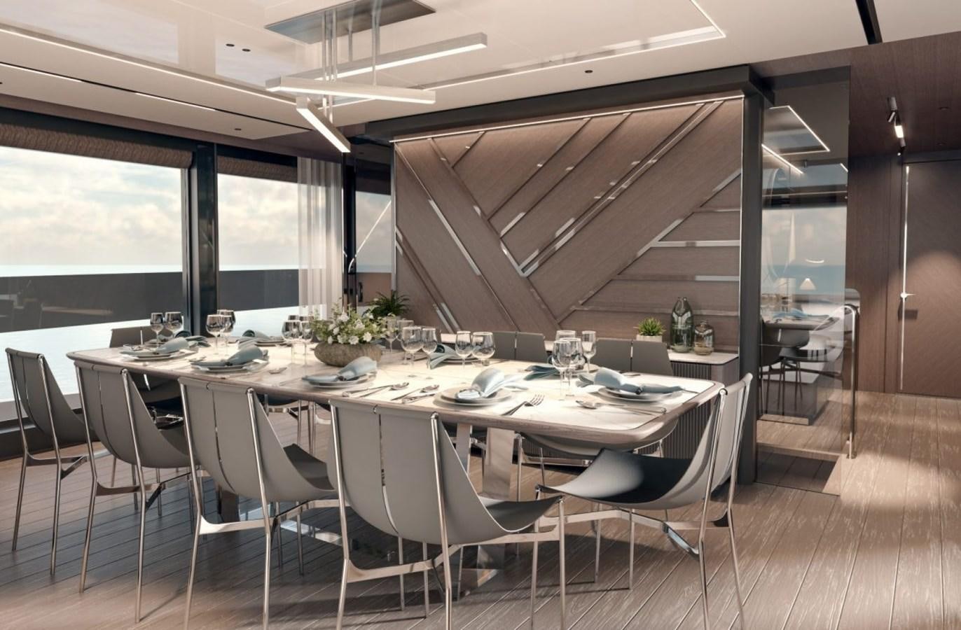 a large room with a table and chairs aboard SUNSEEKER 100 Yacht for Sale