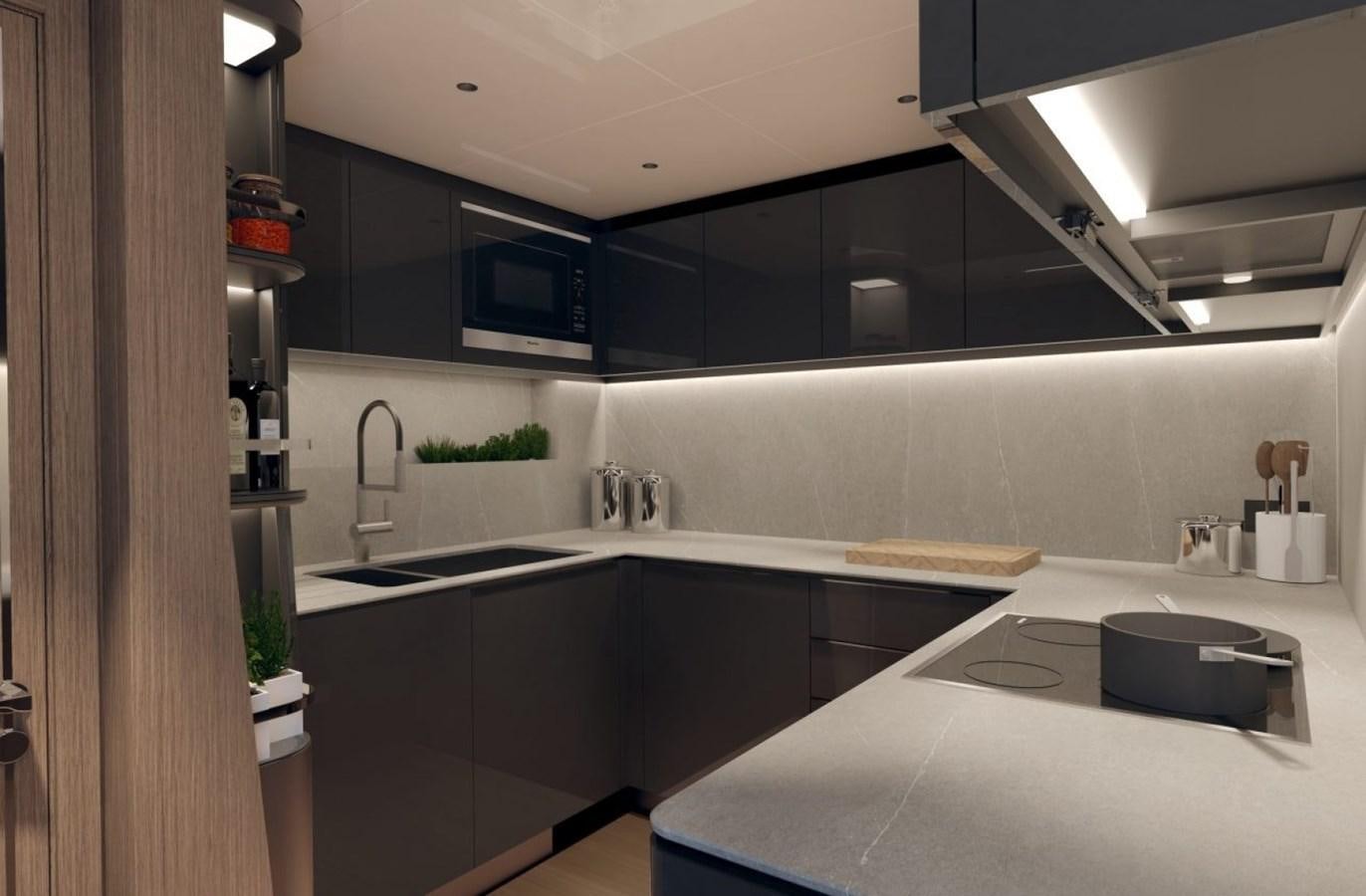 a kitchen with a large island aboard SUNSEEKER 100 Yacht for Sale