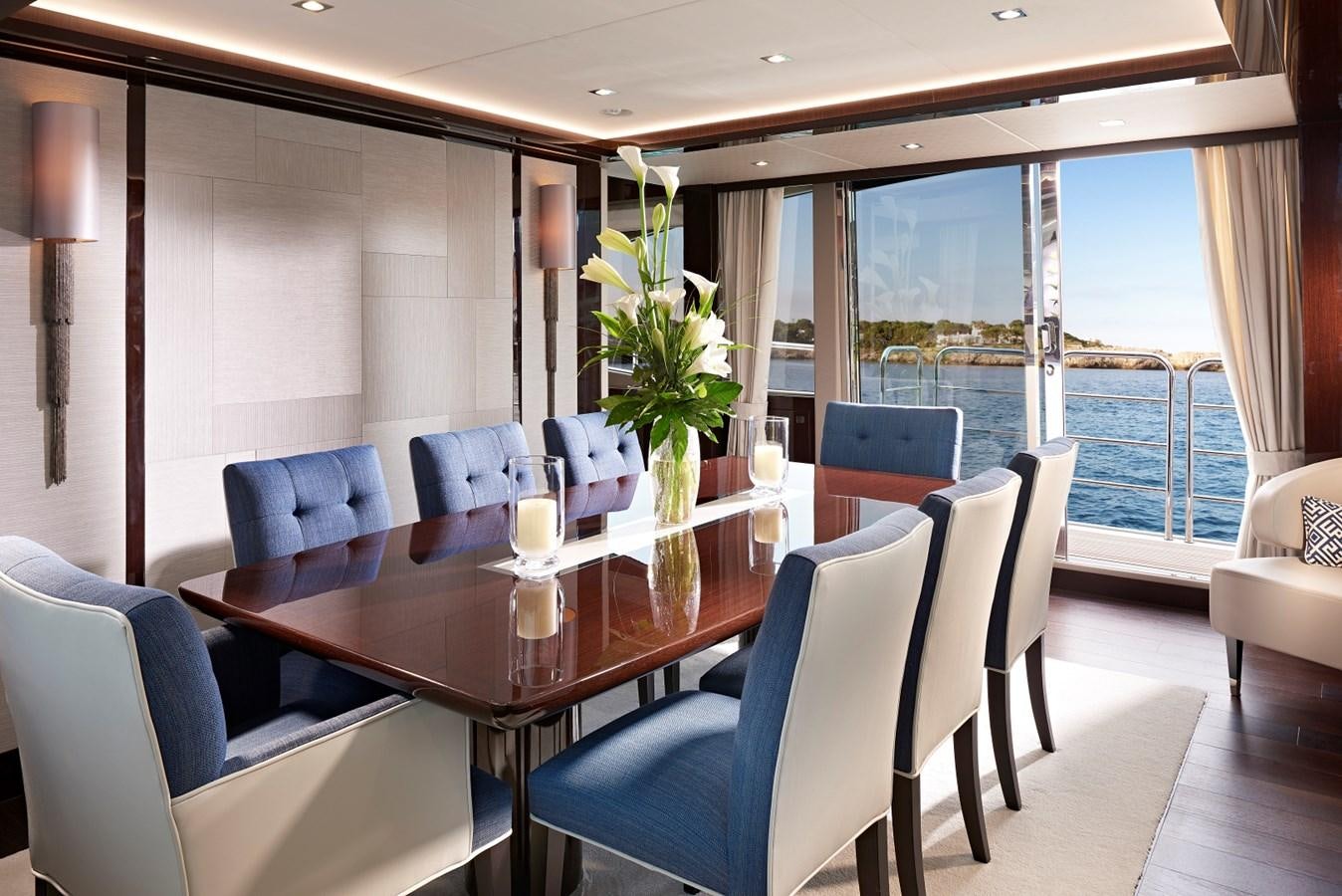 a dining room with a table and chairs aboard 95 YACHT Yacht for Sale