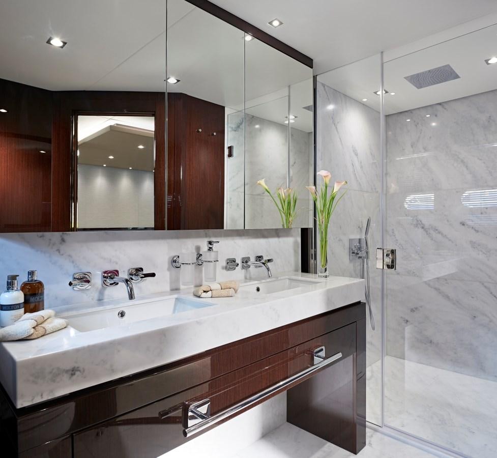 a bathroom with a large mirror aboard 95 YACHT Yacht for Sale