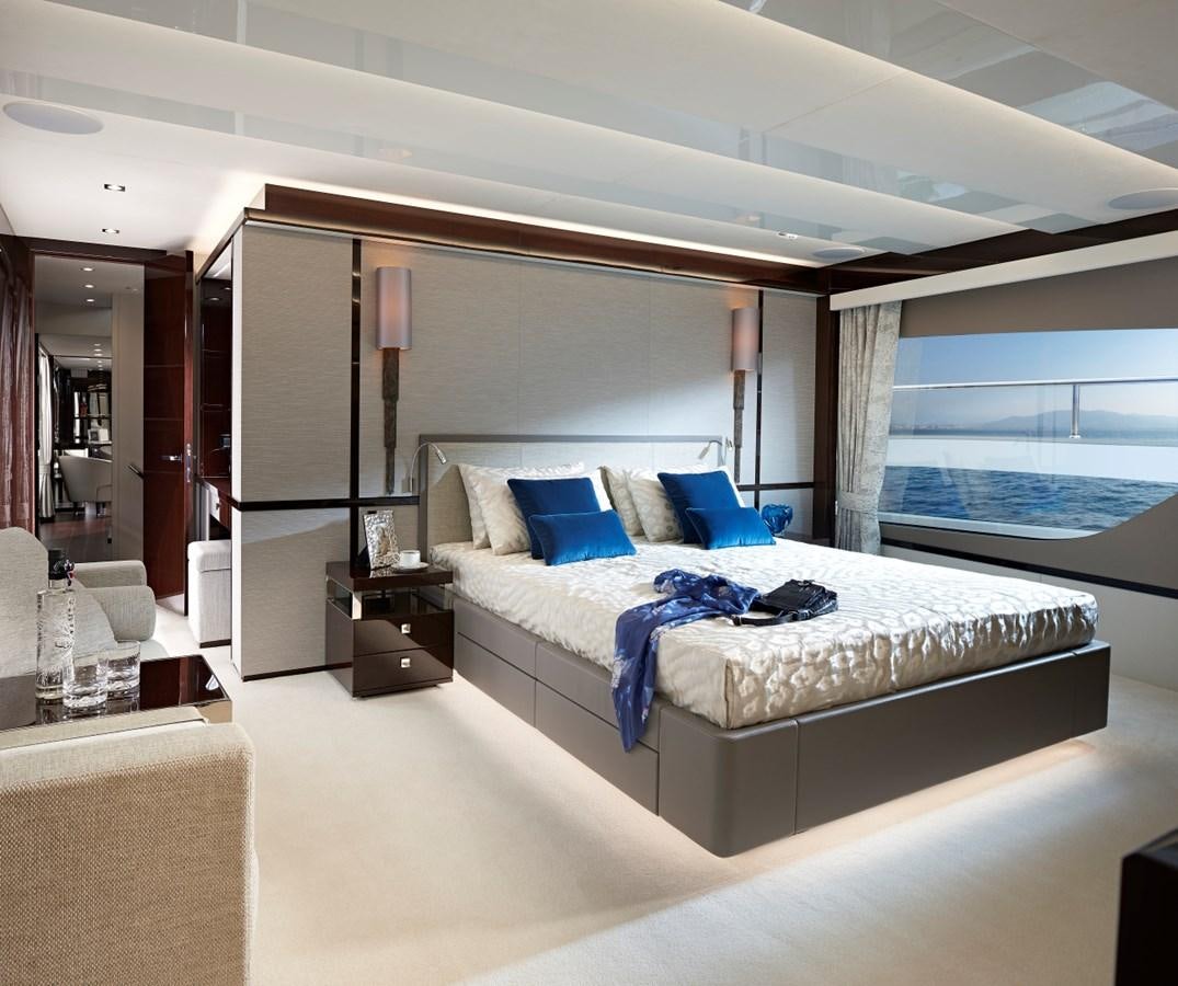 a bedroom with a large bed aboard 95 YACHT Yacht for Sale