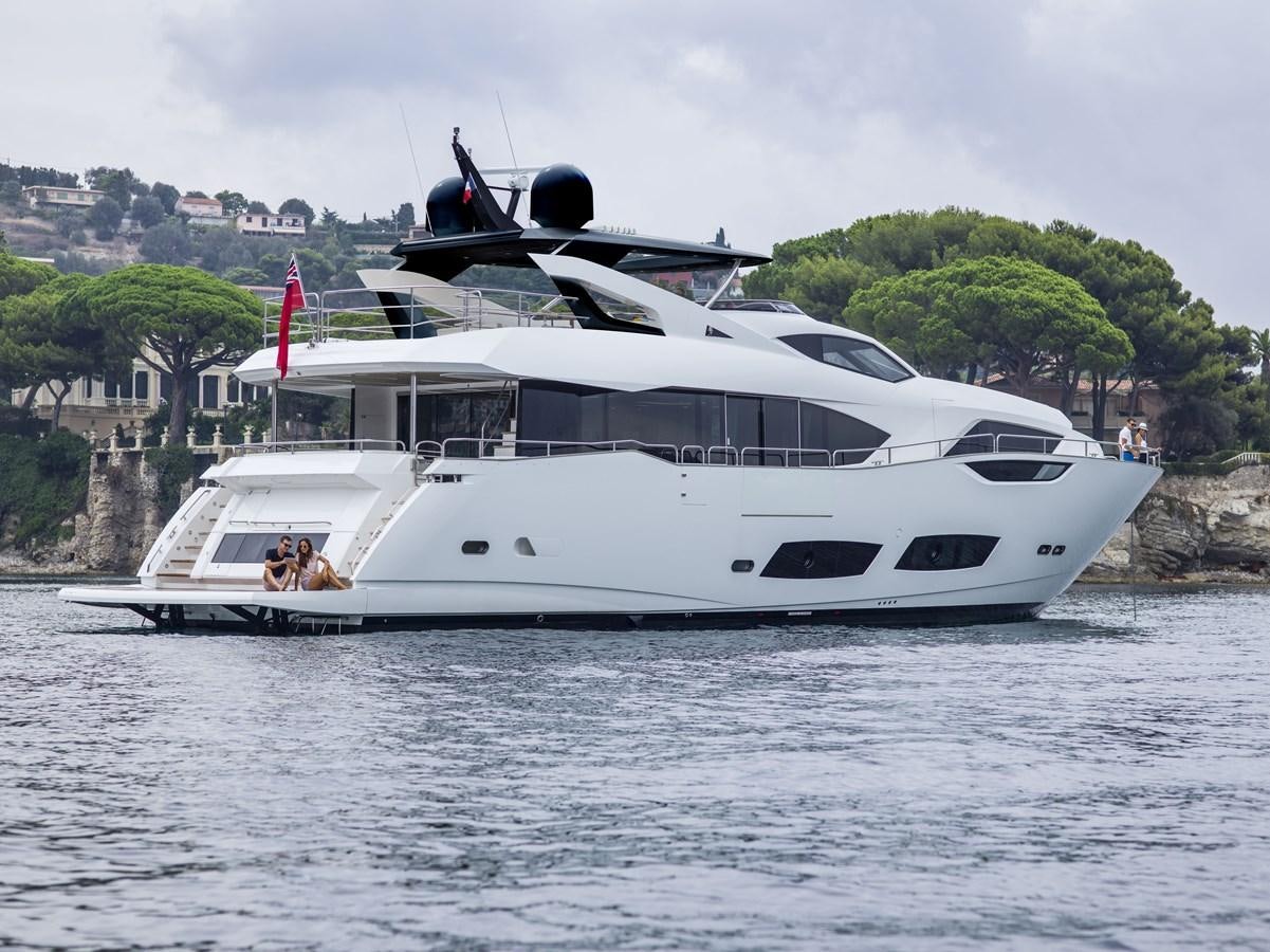 a white yacht with a helicopter on top of it aboard 95 YACHT Yacht for Sale