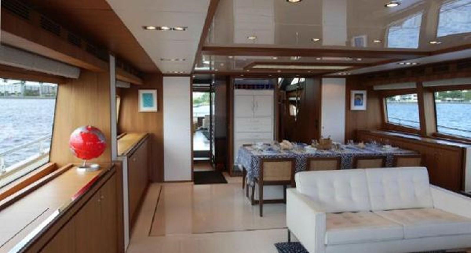 a room with couches and a balloon aboard PRIVILEGIO Yacht for Sale