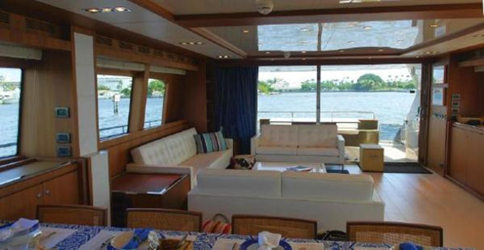a room with a bed and a couch aboard PRIVILEGIO Yacht for Sale