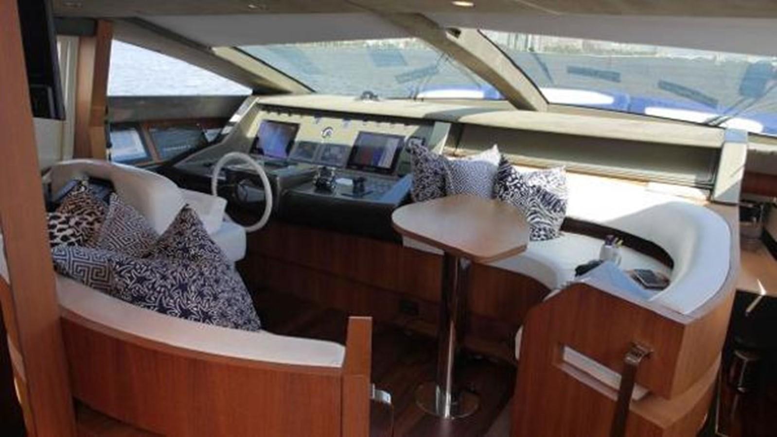 a boat with a bed and a desk aboard PRIVILEGIO Yacht for Sale