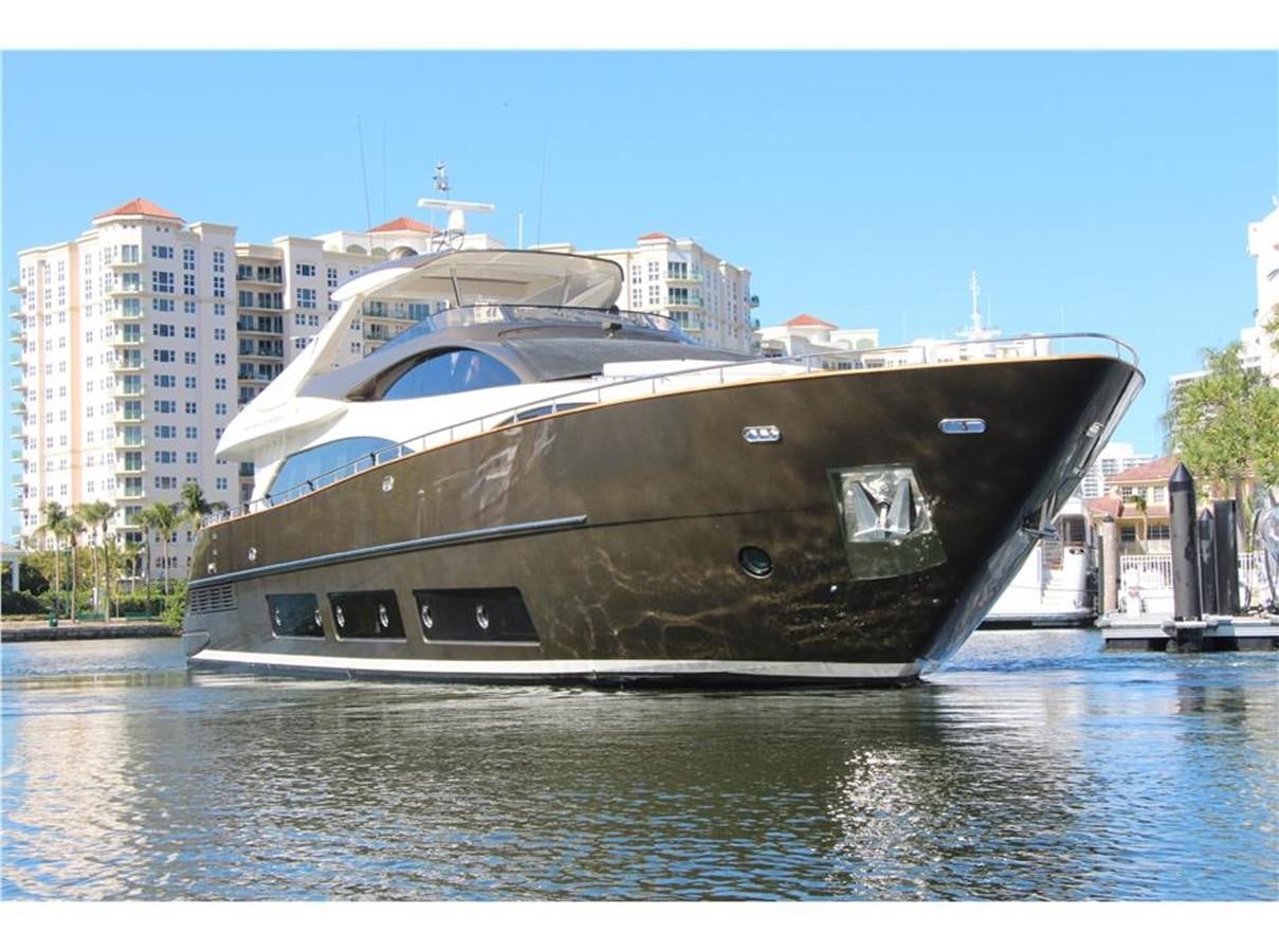 a large boat in a body of water aboard PRIVILEGIO Yacht for Sale