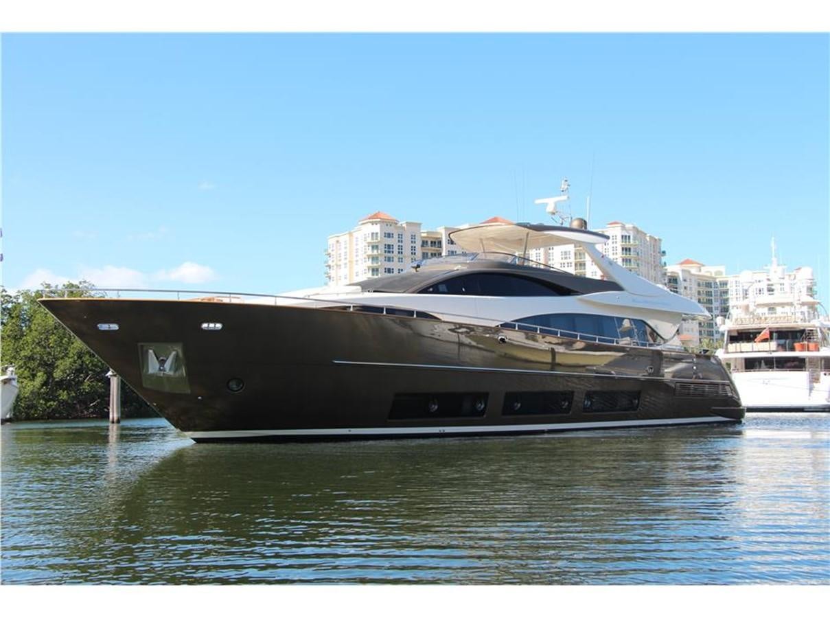a black and white boat on water aboard PRIVILEGIO Yacht for Sale