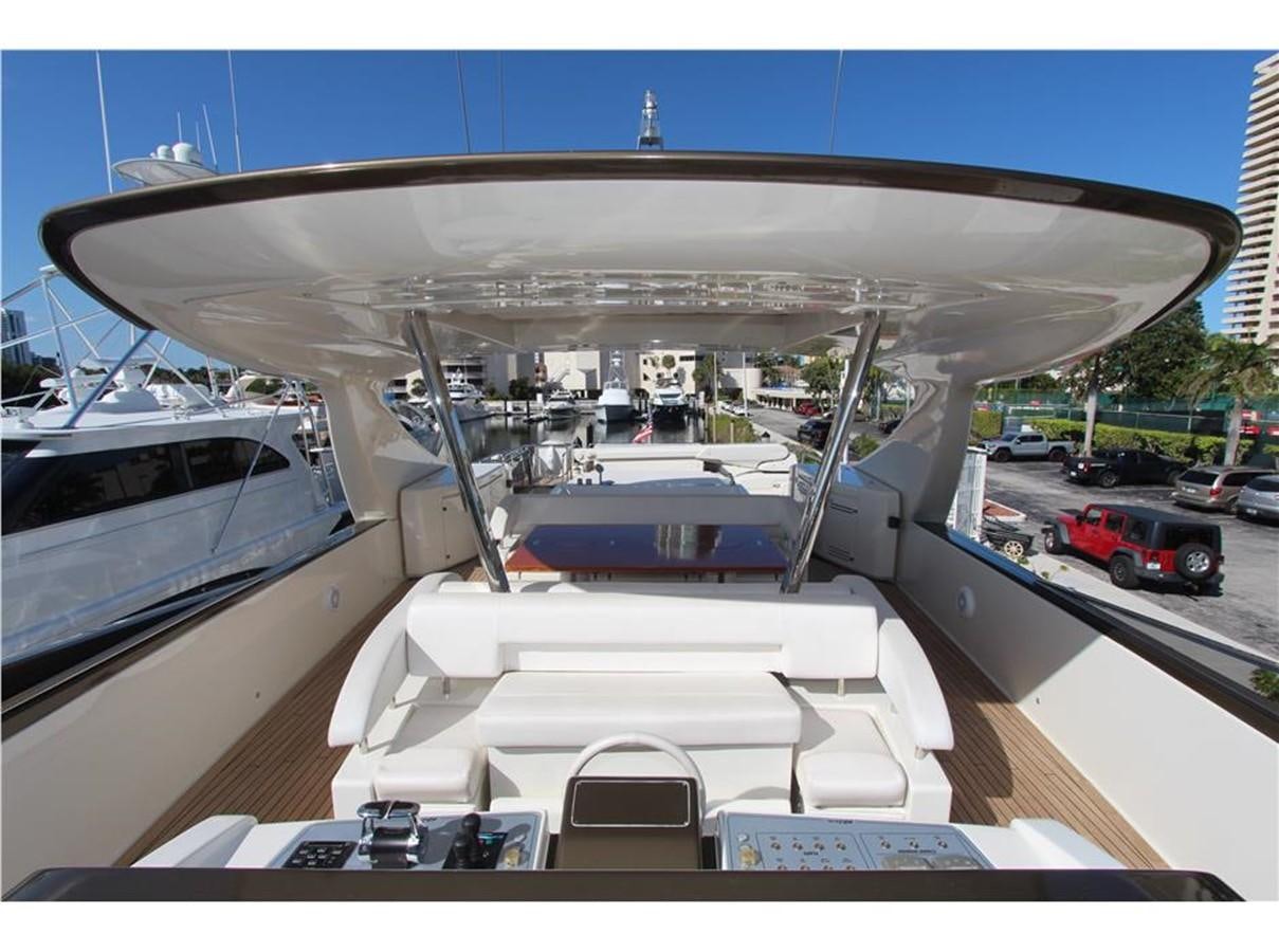a large boat on a dock aboard PRIVILEGIO Yacht for Sale