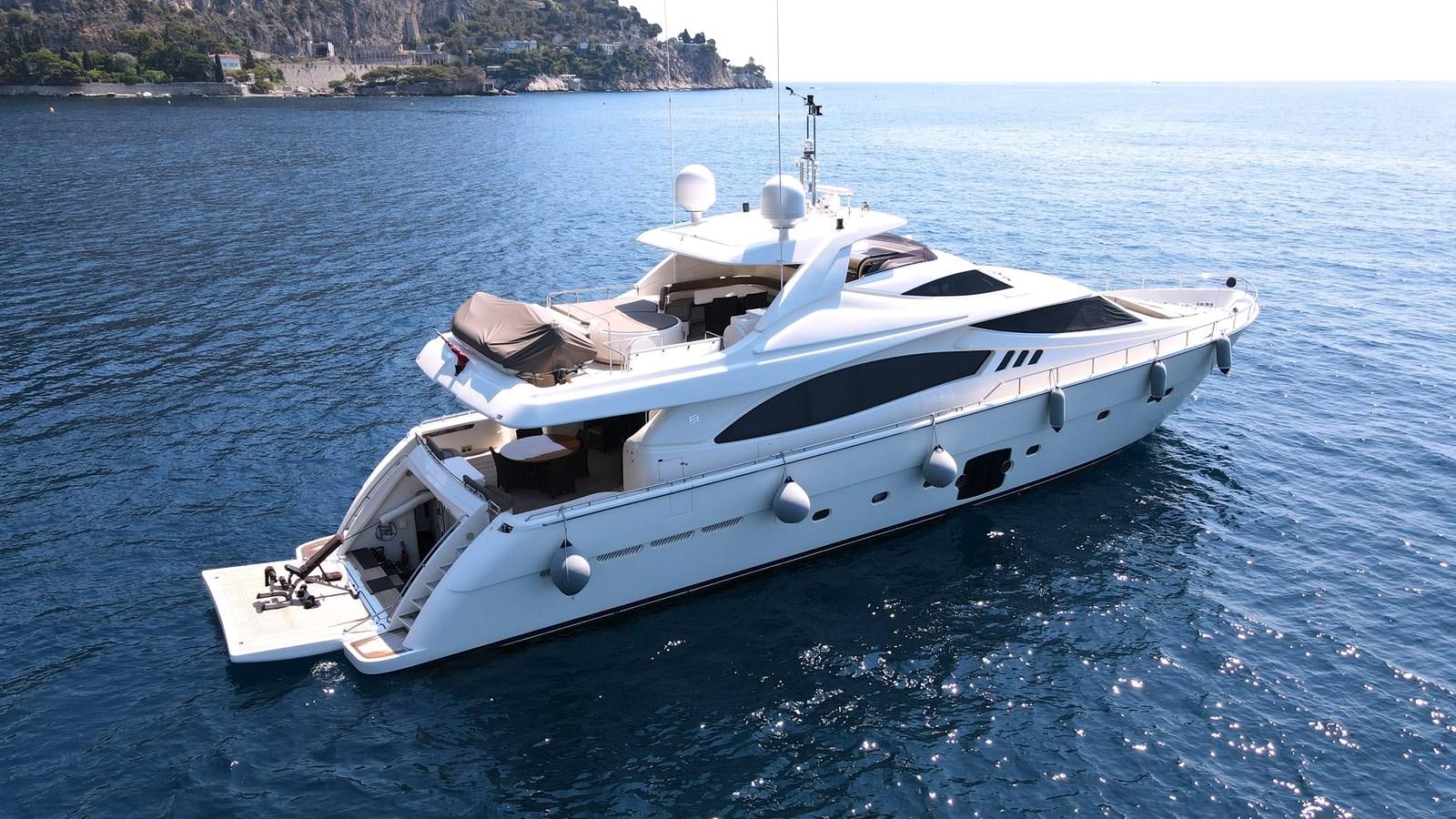 a white boat in the water aboard MELI Yacht for Charter