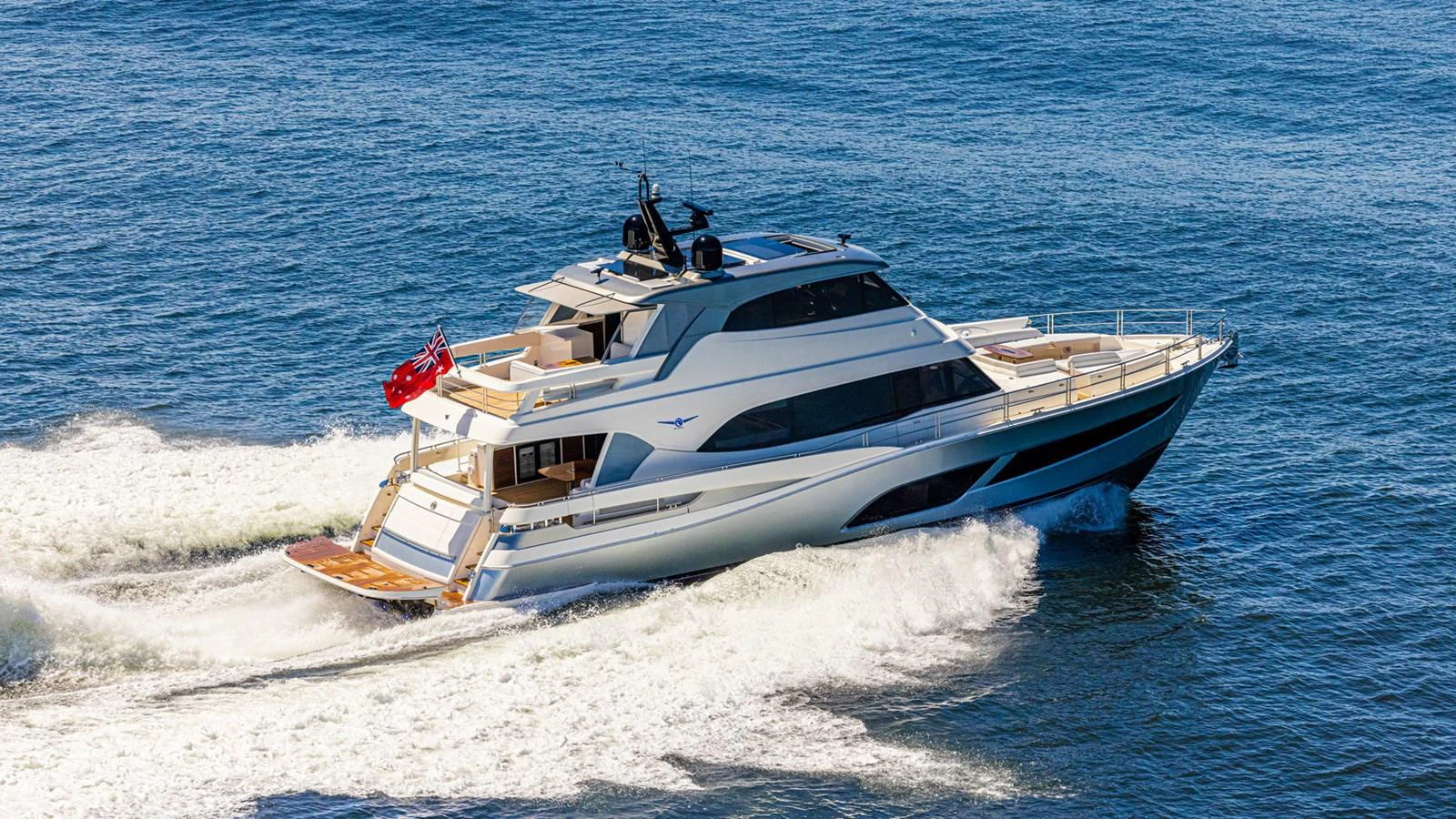 a boat on the water aboard 78 MOTOR YACHT ENCLOSED Yacht for Sale