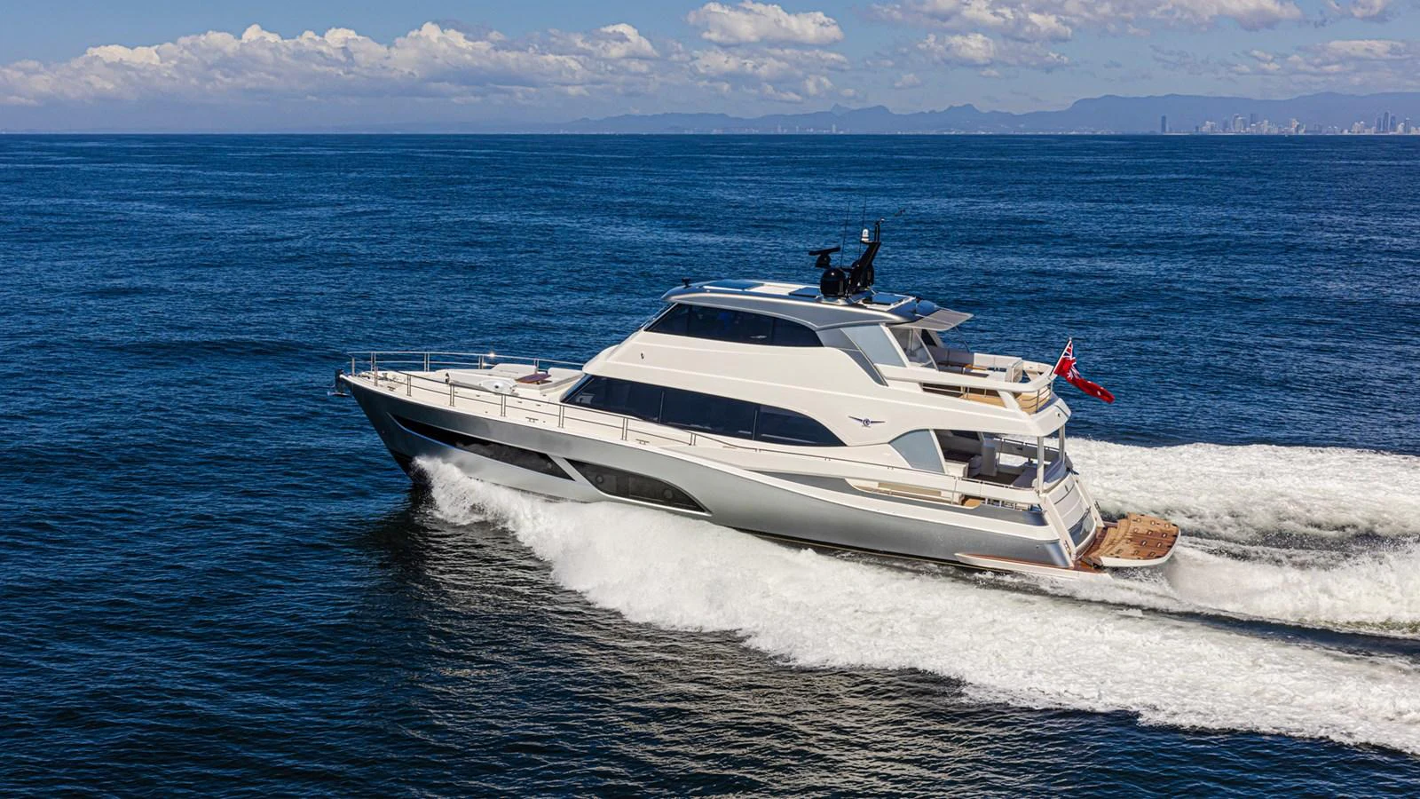 a boat on the water aboard 78 MOTOR YACHT ENCLOSED Yacht for Sale