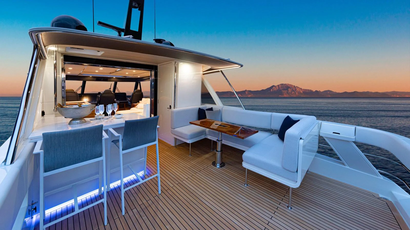 a boat on the water aboard 78 MOTOR YACHT ENCLOSED Yacht for Sale