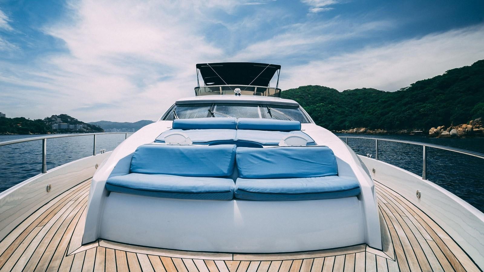a boat on a dock aboard LUCKY BEAR Yacht for Sale
