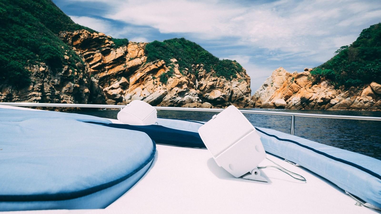 a boat on the water aboard LUCKY BEAR Yacht for Sale