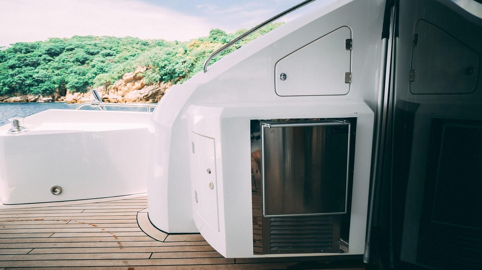 a white rectangular object with a black door and a black rectangular object with a black rectangular object on aboard LUCKY BEAR Yacht for Sale