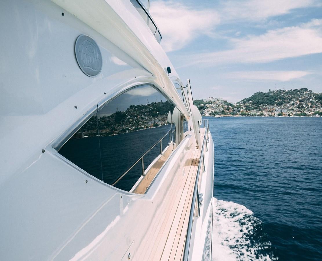 a boat on the water aboard LUCKY BEAR Yacht for Sale