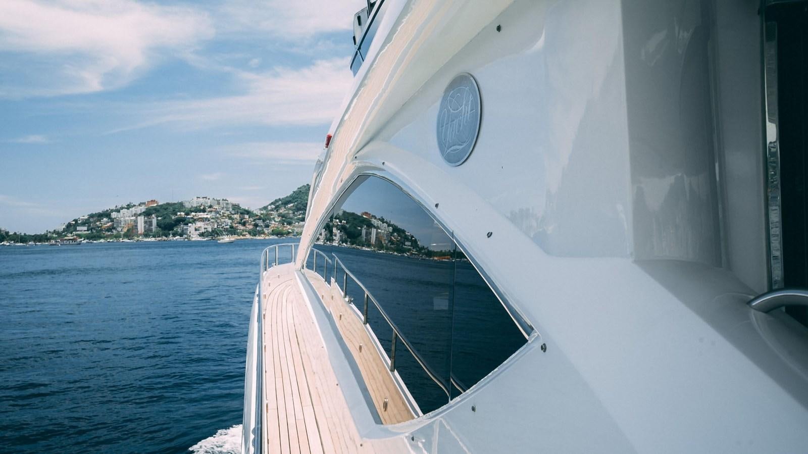 a boat on the water aboard LUCKY BEAR Yacht for Sale