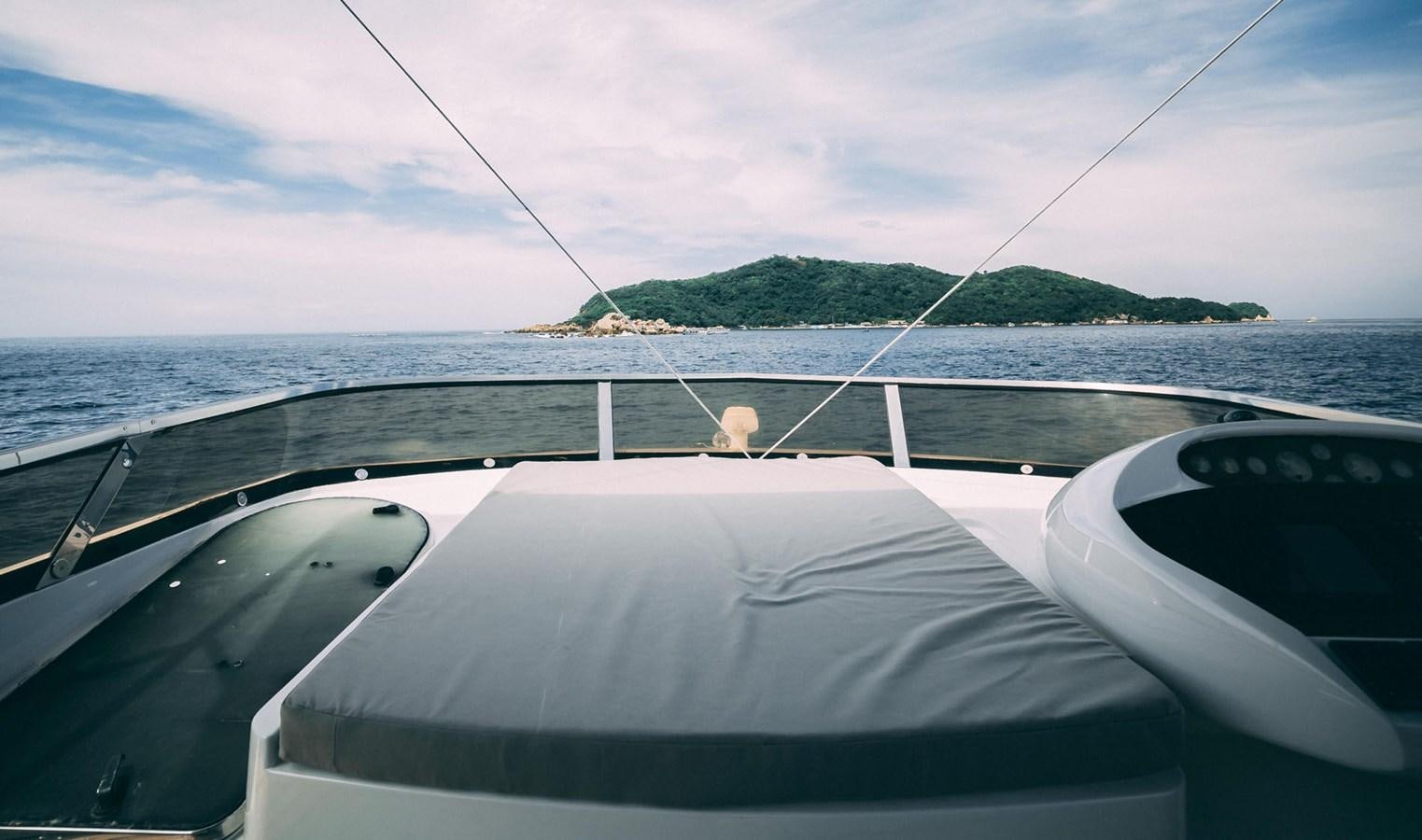 a boat on the water aboard LUCKY BEAR Yacht for Sale